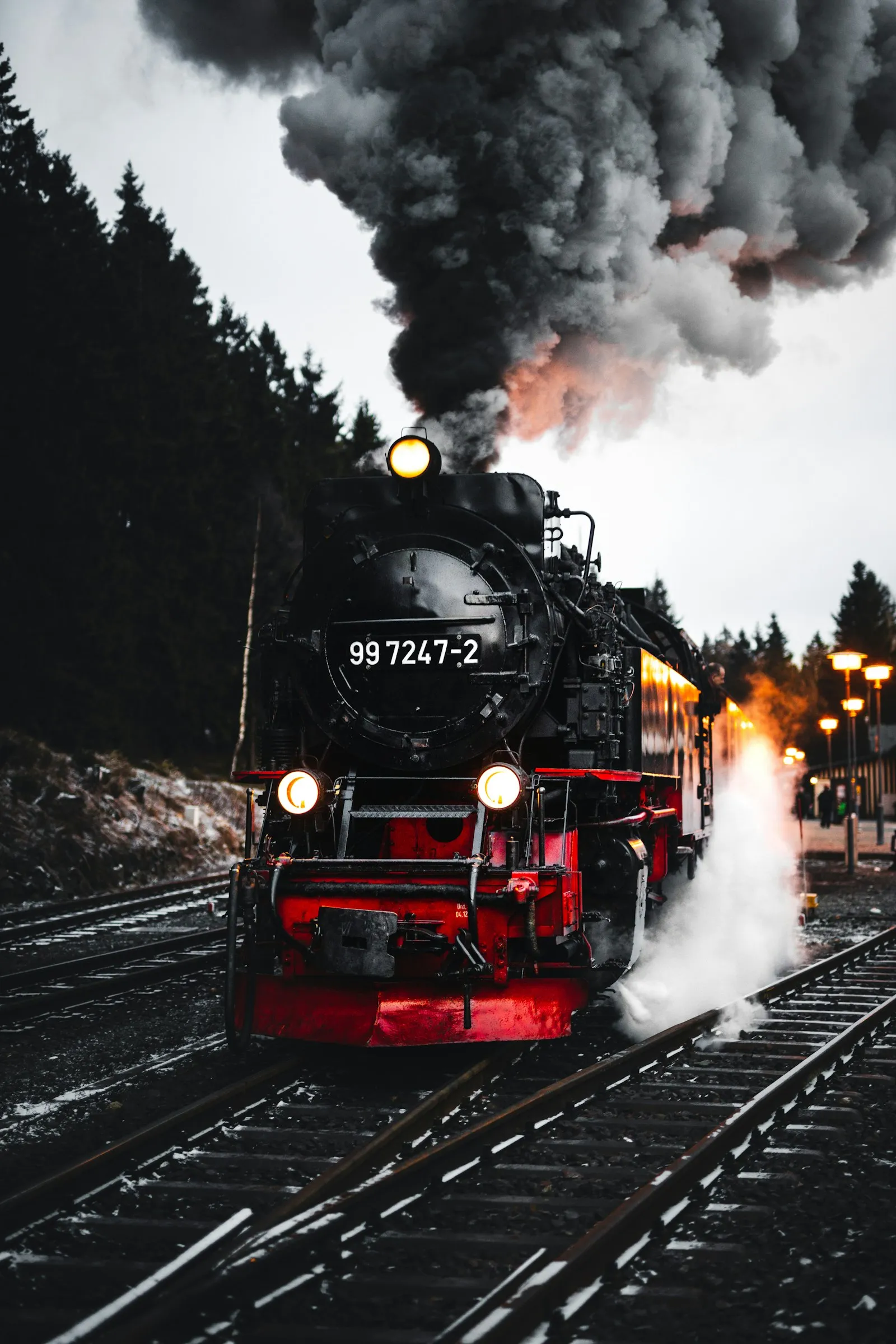 Red-and-black locomotive at speed — the verified-output peak of any train horn buying decision