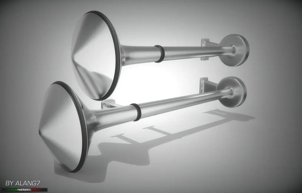 Chrome air horns mounted on a truck, the kind of setup a 12-volt onboard compressor feeds