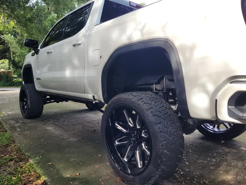 White GMC Sierra pickup truck — the platform the Kleinn GMTRK-1 bolt-on train horn kit is designed for