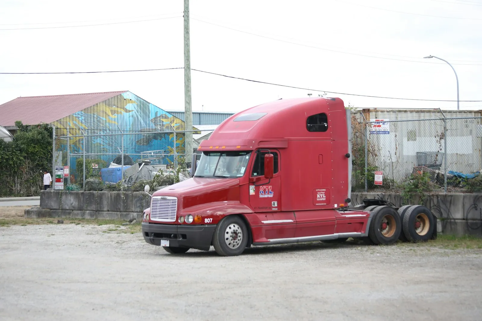 Blue and brown freight train on tracks — the yard-switcher world where the Nathan P3 lives