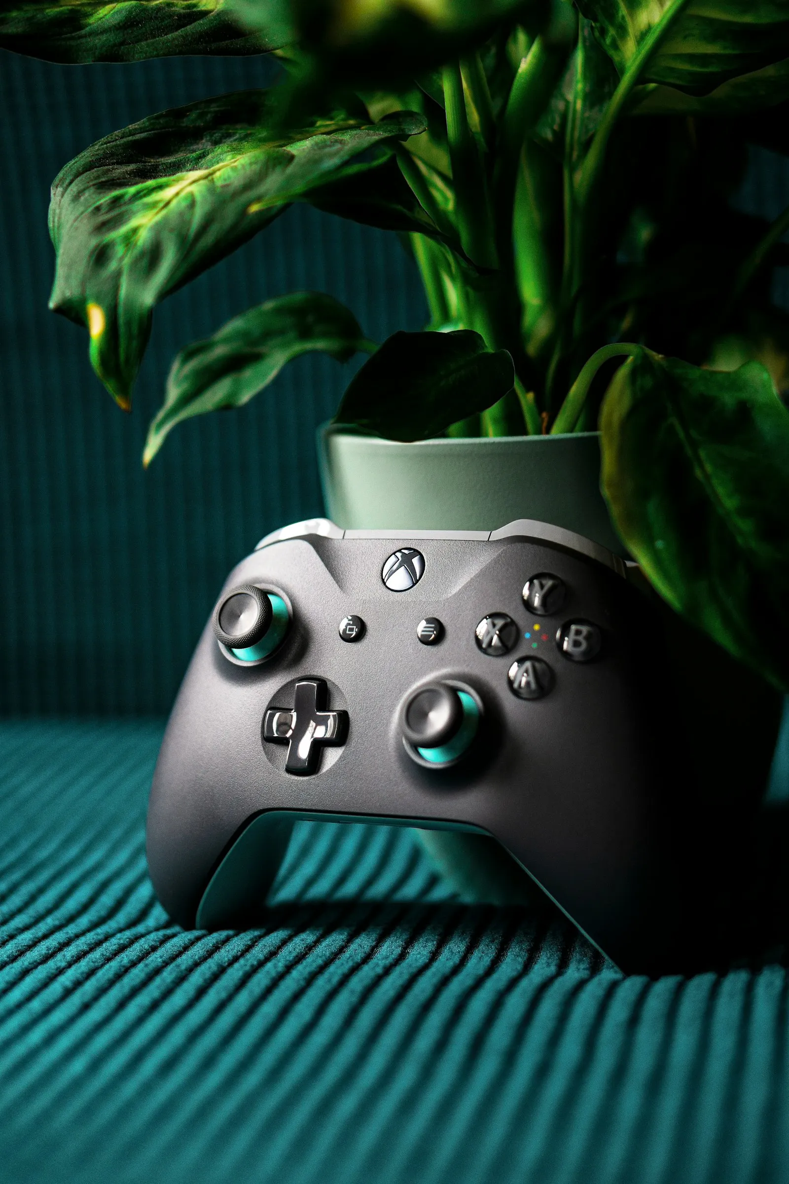Black gaming controller — the in-game audio context where Roblox sound IDs play