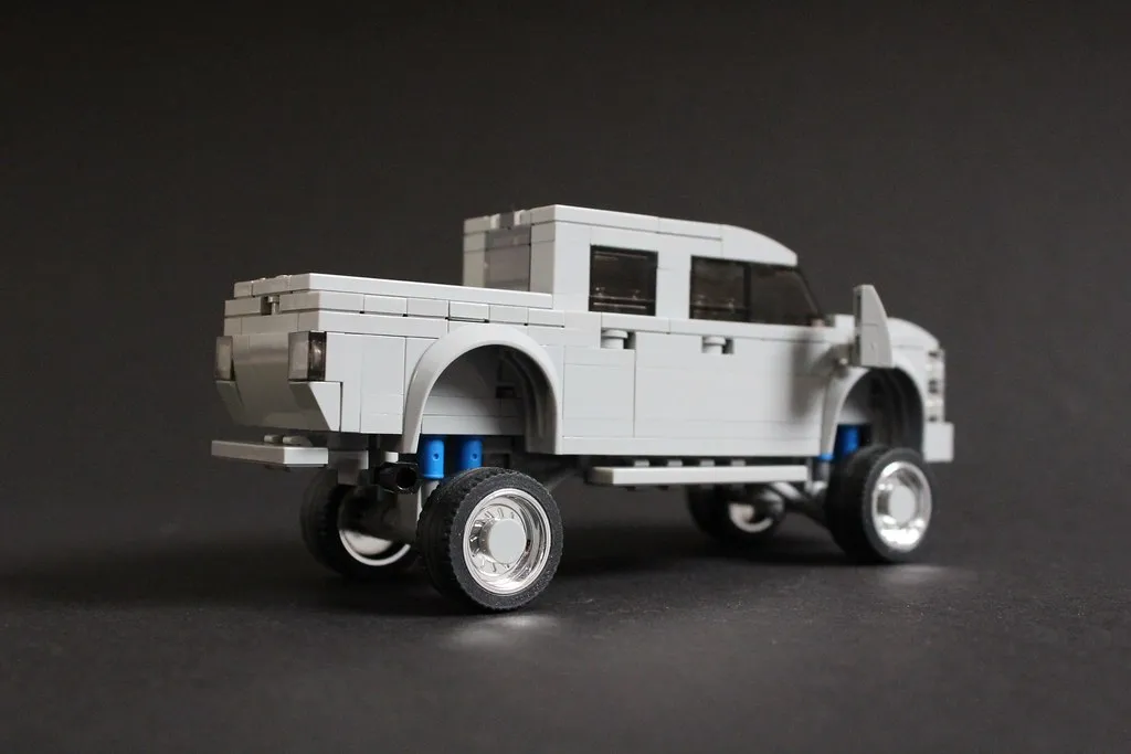 Custom black pickup truck of the kind owners fit with quad-trumpet train horns