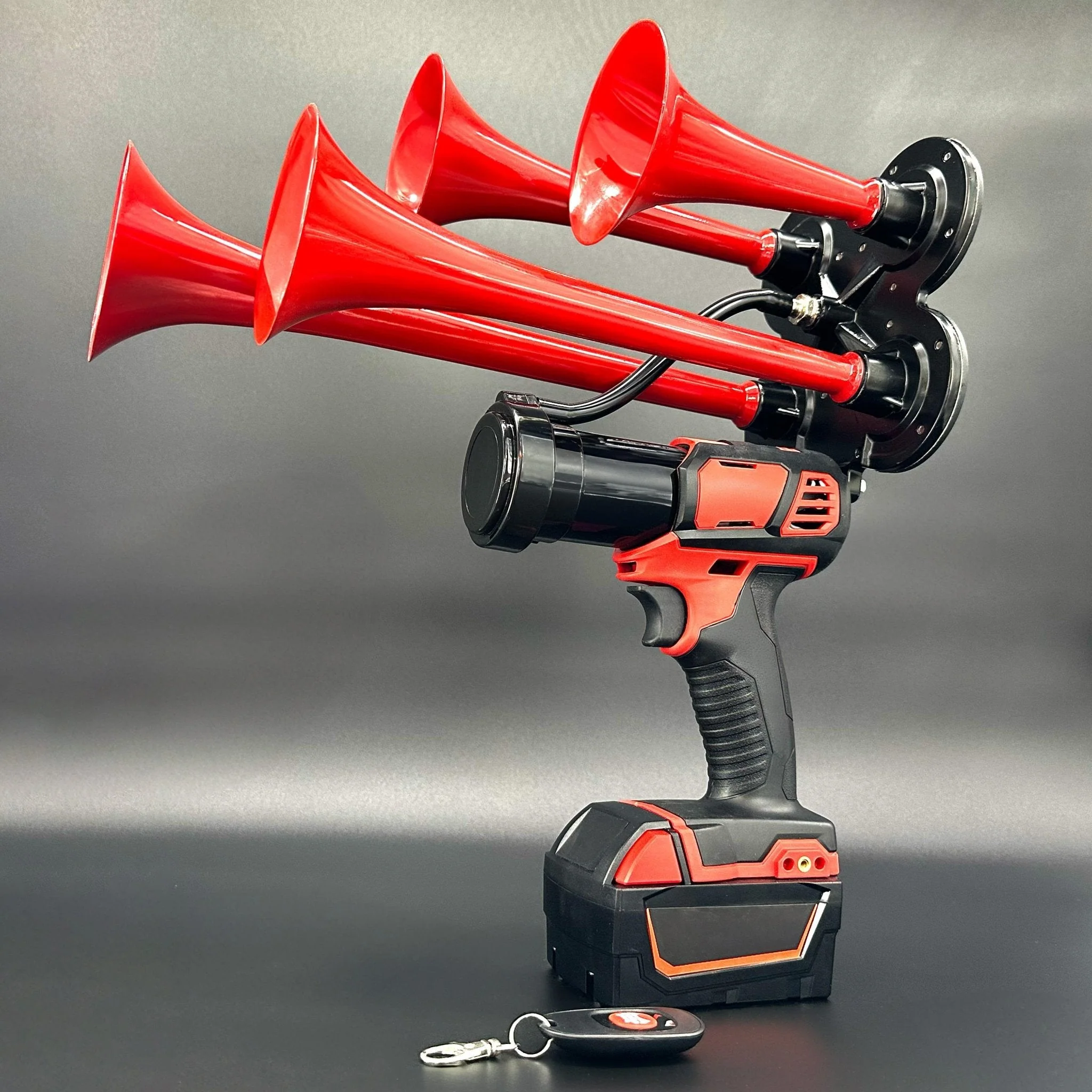 BossHorn M18 quad train horn red trumpet variant with remote on dark background