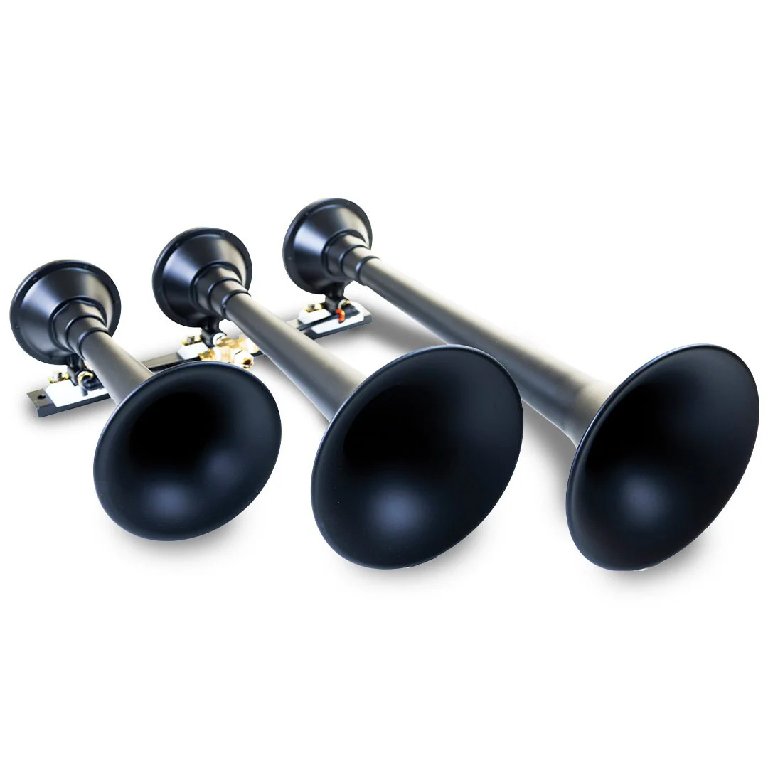 Kleinn Demon Model 730 triple train horn in XCR 2.0 black — three stainless-steel trumpets on a flat rack